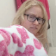 A plump blonde girl wearing glasses records herself from a rear position as she shits while sitting on a toilet. Some visible poop action from behind. She also shows us the finished product. Presented in 720P HD. Over 3.5 minutes.
